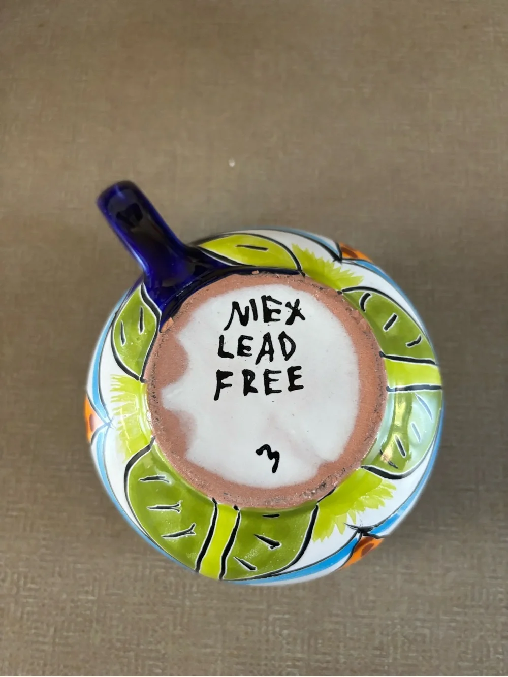 Hand-Painted Blue and White Floral Ceramic Cup